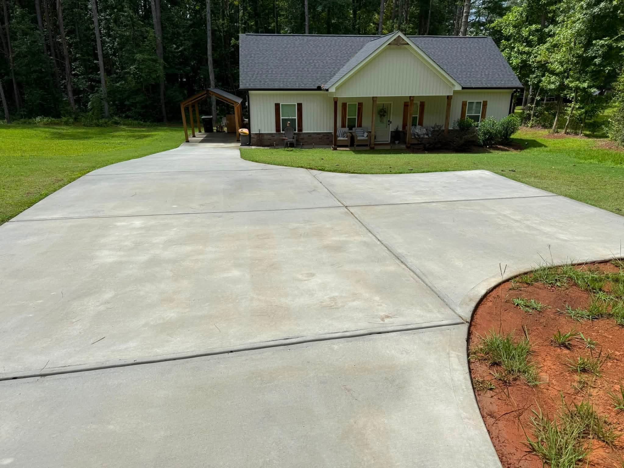 Clean driveway and walkway after pressure washing