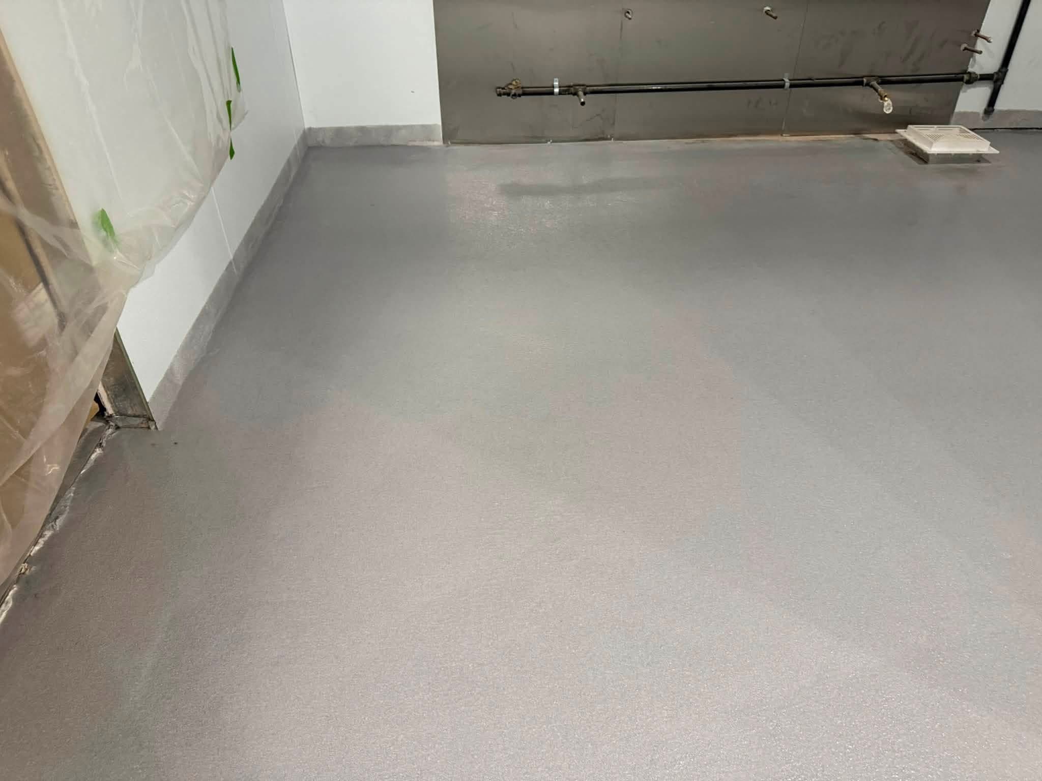 Finished slip-resistant urethane coated floor in a commercial kitchen
